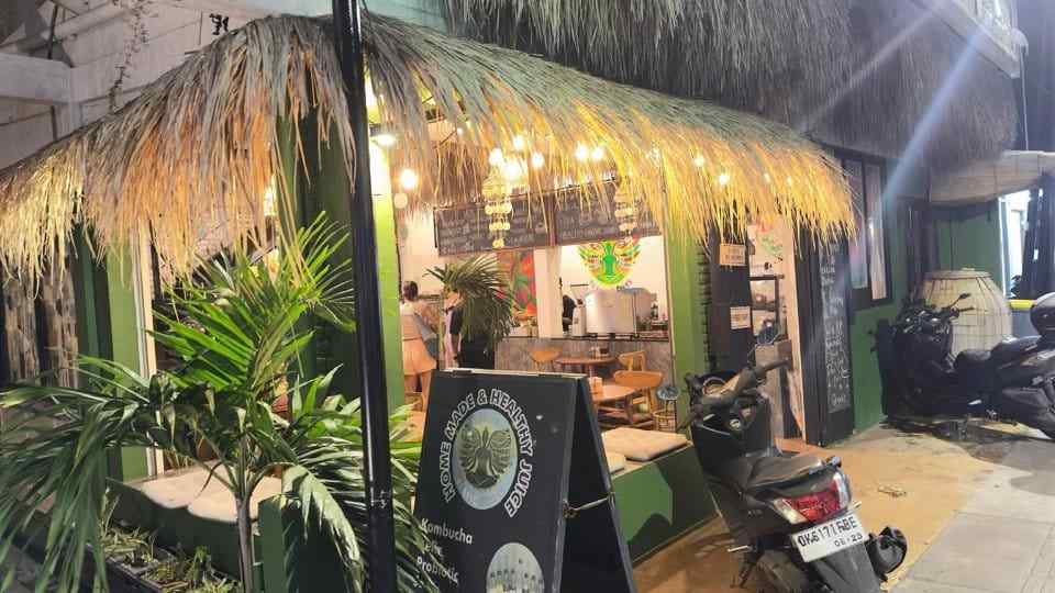 Night entrance exterior of Slavic Roots Cafe & Eatery in Berawa Canggu, Bali